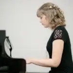 Ruscica Music pianist performing on Jessup piano at the Jessup lecture hall