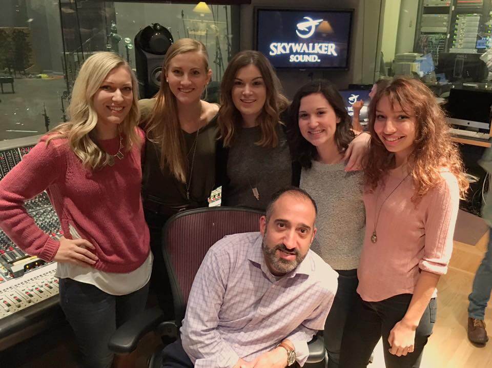 Tom Ruscica and Lauren Horst posing with girls at Skywalker Ranch